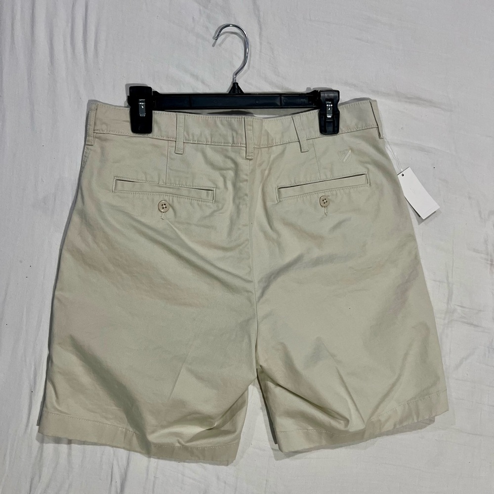 Tan and cream shorts with a casual, preppy vibe 7" inseam
